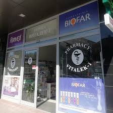 Vitalek Pharmacy Logo